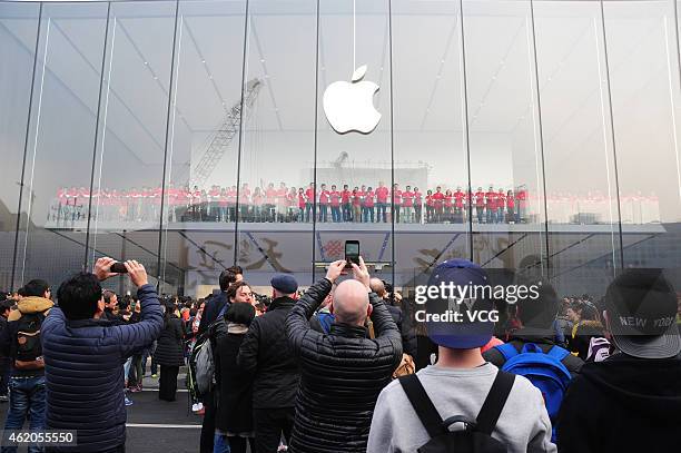The Apple flagship store opens at Pinghai Road on January 24, 2015 in Hangzhou, Zhejiang province of China. Citizens, sales clerks and Apple fans...
