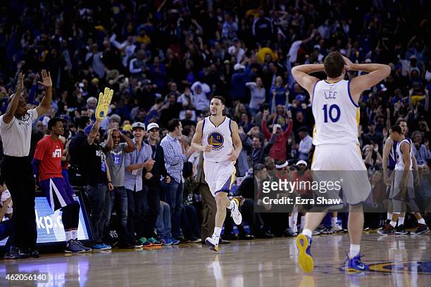 David Lee reacts as Klay Thompson of the Golden State Warriors runs back downcourt after Thompson made a three-point basket in the third quarter of...