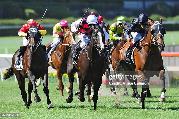 Vlad Duric riding Mourinho defeats Matthew Allen riding It is Written and Ben Melham riding Dissident in Race 7, the Jeep Australia Stakes during...