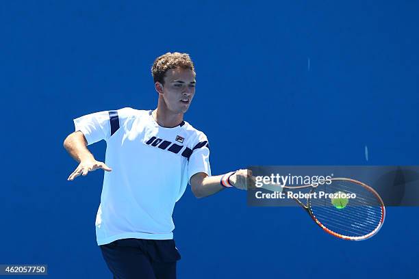 Aleksandre Bakshi of Georgia in action in his match against Roman Safiullin of Russia during the Australian Open 2015 Junior Championships at...