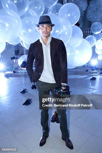 Chinese Actor Hu Bing attends the Berluti Menswear Fall/Winter 2015-2016 Show as part of Paris Fashion Week. Held at Musee des Arts Decoratifs on...