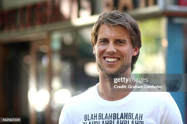 Andreas Seppi of Italy smiles as he visits Italian cafe Pellegrini's during the 2015 Australian Open at Melbourne Park on January 24, 2015 in...