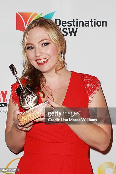 Kristy Cox poses after winning a Golden Guitar for 'Bluegrass Recording of the Year' during the 43rd Country Music Awards of Australia on January 24,...