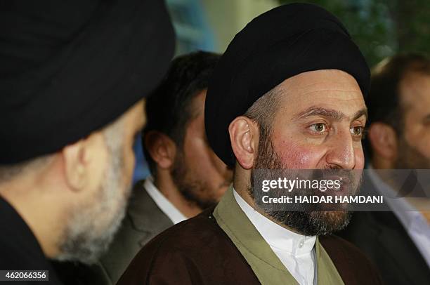 Iraqi Shiite Muslim leader Ammar al-Hakim speaks during a meeting held at his house in the southern Shiite city of Najaf on January 23, 2015 with...