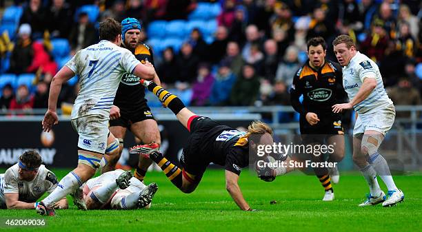 Wasps fly half Andy Goode is stopped by the Leinster defence during the European Rugby Champions Cup match between Wasps and Leinster Rugby at The...