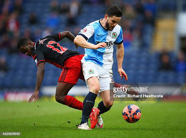 Craig Conway of Blackburn Rovers battles with Nathan Dyer of Swansea City during the FA Cup Fourth Round match between Blackburn Rovers and Swansea...