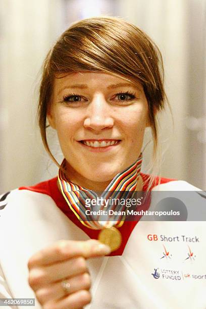 Elise Christie of Great Britain poses after winning the Womens 1500m final gold medal during day 2 of the ISU European Short Track Speed Skating...