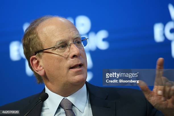 Laurence "Larry" Fink, chief executive of BlackRock Inc., gestures as he speaks during a session on the final day of the World Economic Forum in...