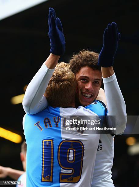 Rudy Gestede of Blackburn Rovers celebrates with Chris Taylor as he scores their second goal during the FA Cup Fourth Round match between Blackburn...