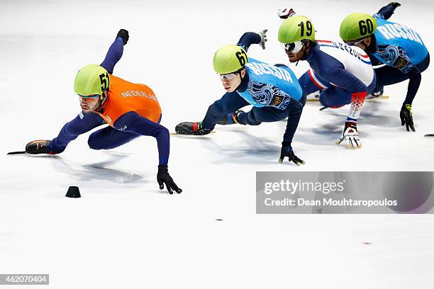 Sjinkie Knegt of the Netherlands and Semion Elistratov of Russia compete in the Mens 1500m final during day 2 of the ISU European Short Track Speed...