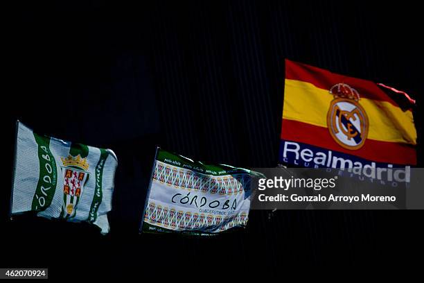 Cordoba CF flags flutter behind a Rel Madrid a merchandaising stall before the La Liga match between Cordoba CF and Real Madrid CF at El Arcangel...
