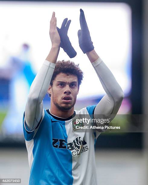 Rudy Gestede applauds fans as he leaves the field during the FA Cup Fourth Round match between Blackburn Rovers and Swansea City at Ewood park on...