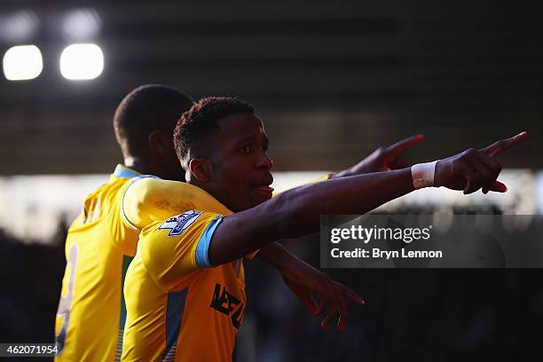 Yaya Sanogo of Crystal Palace celebrates with Wilfried Zaha as he scores their second goal during the FA Cup Fourth Round match between Southampton...