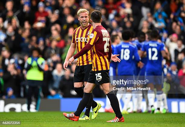 Andrew Davies of Bradford City and Andrew Halliday of Bradford City exchange words after Ramires of Chelsea scored his team's second goal during the...