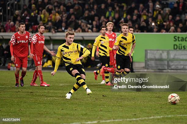 Jakub Blaszczykowski of Borussia Dortmund scores their first goal during the friendly match between Fortuna Duesseldorf and Borussia Dortmund at...