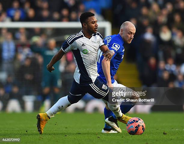 Stephane Sessegnon of West Brom is closed down by David Cotterill of Birmingham City during the FA Cup Fourth Round match between Birmingham City and...