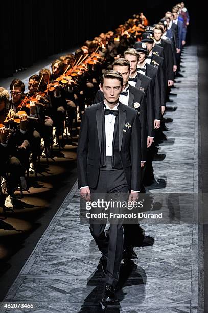 Models walk the runway during the Dior Homme Menswear Fall/Winter 2015-2016 show as part of Paris Fashion Week on January 24, 2015 in Paris, France.