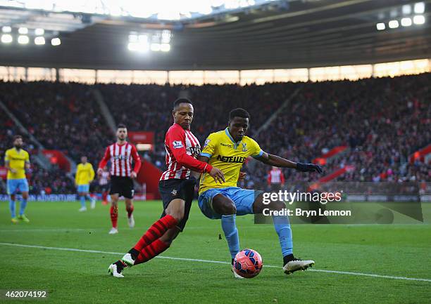 Wilfried Zaha of Crystal Palace and Nathaniel Clyne of Southampton battle for the ball during the FA Cup Fourth Round match between Southampton and...