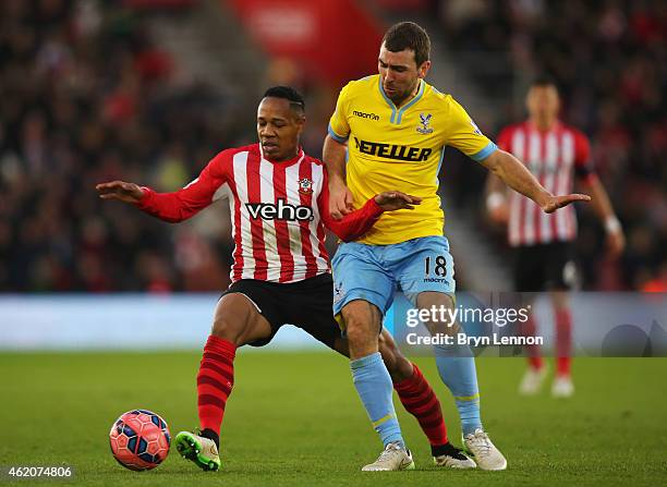 Nathaniel Clyne of Southampton battles with James McArthur of Crystal Palace during the FA Cup Fourth Round match between Southampton and Crystal...