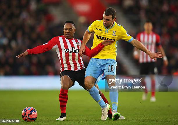 Nathaniel Clyne of Southampton battles with James McArthur of Crystal Palace during the FA Cup Fourth Round match between Southampton and Crystal...