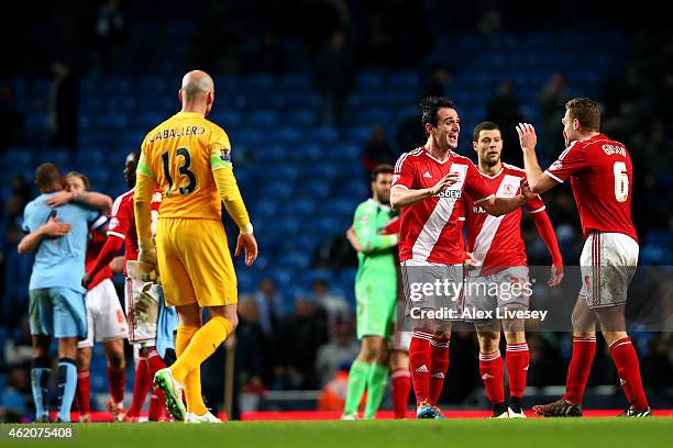 Garcia Kike of Middlesbrough celebrates with team-mate Ben Gibson after the FA Cup Fourth Round match between Manchester City and Middlesbrough at...