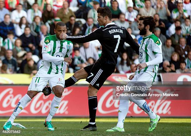 Cristiano Ronaldo of Real Madrid CF kicks Edimar Fraga of Cordoba CF, that motivated his expulsion form the pitch after being reprimanded with a red...