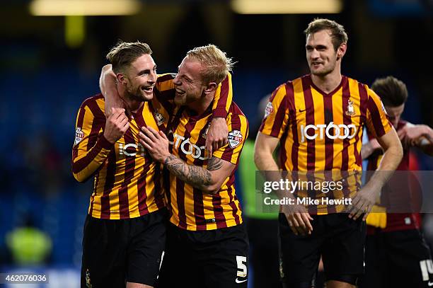 Gary Liddle of Bradford City, Andrew Davies of Bradford City and James Hanson of Bradford City celebrate following their team's 4-2 victory during...