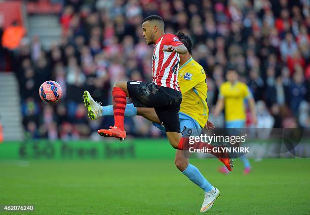 Crystal Palace's Moroccan striker Marouane Chamakh vies with Southampton's English defender Ryan Bertrand during the FA Cup fourth round football...