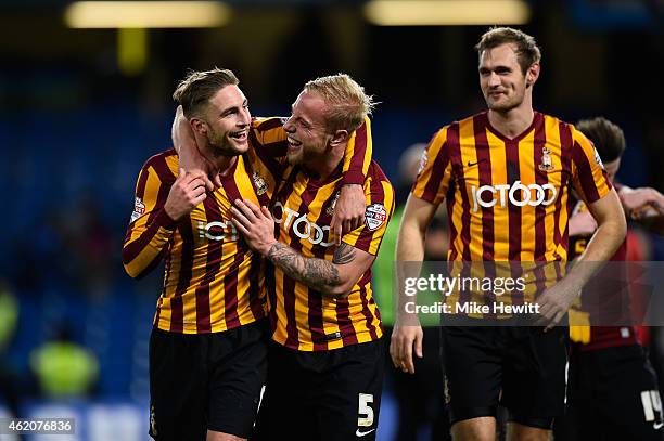 Gary Liddle of Bradford City, Andrew Davies of Bradford City and James Hanson of Bradford City celebrate following their team's 4-2 victory during...