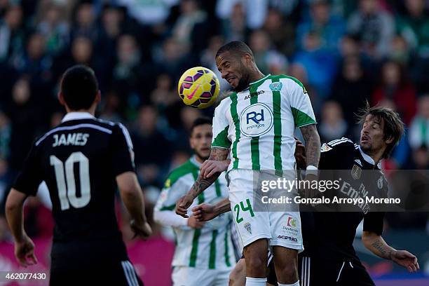 Tiago Manuel Dias Correia of Cordoba CF wins the header after Fabio Coentrao of Real Madrid CF during the La Liga match between Cordoba CF and Real...