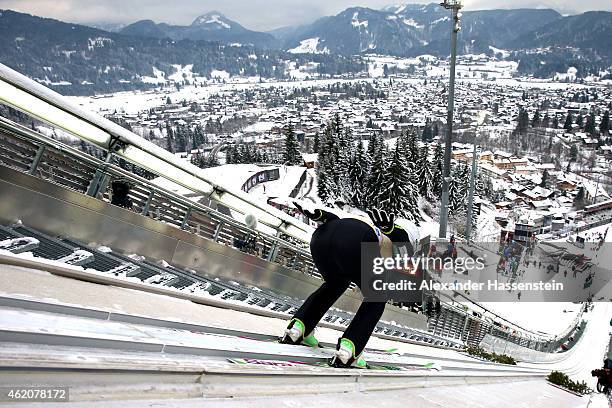 Sara Takanashi of Japan competes during day one of the Women Ski Jumping World Cup event at Schattenberg-Schanze Erdinger Arena on January 24, 2015...