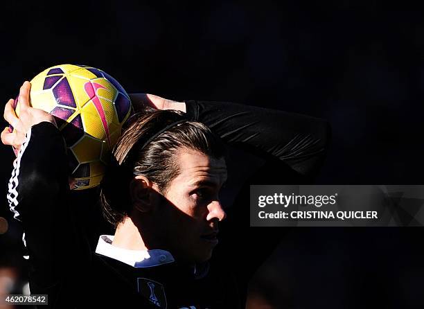 Real Madrid's Welsh forward Gareth Bale throws a ball during the Spanish league football match Cordoba CF vs Real Madrid CF at the Nuevo Arcangel...