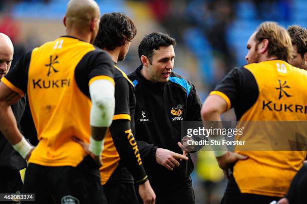 Wasps coach Stephen Jones issues instructions before the European Rugby Champions Cup match between Wasps and Leinster Rugby at The Ricoh Arena on...