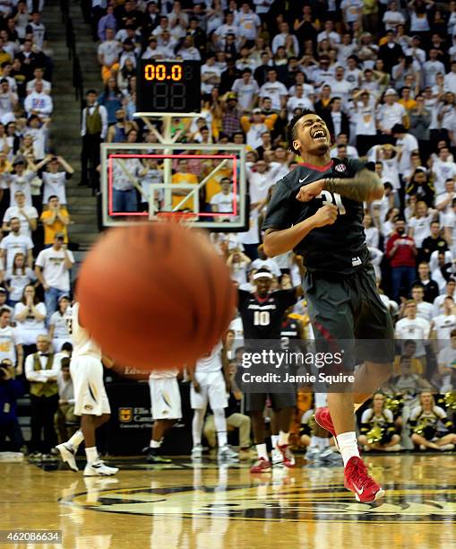 Anton Beard of the Arkansas Razorbacks reacts after Wes Clark of the Missouri Tigers misses two free throws that would have won or tied the game for...