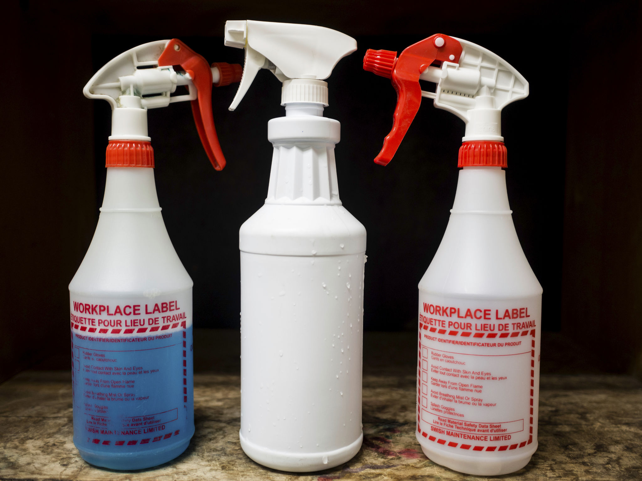 janitorial supplies cleaning spray bottles plastic writing words wood shelves janitorial supplies cleaning spray bottles plastic writing words wood shelves