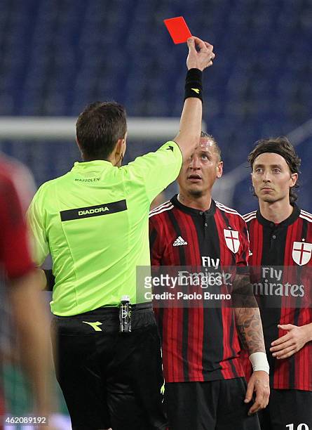 The referee Paolo Mazzoleni shows the red card to Philippe Mexes of AC Milan during the Serie A match between SS Lazio and AC Milan at Stadio...
