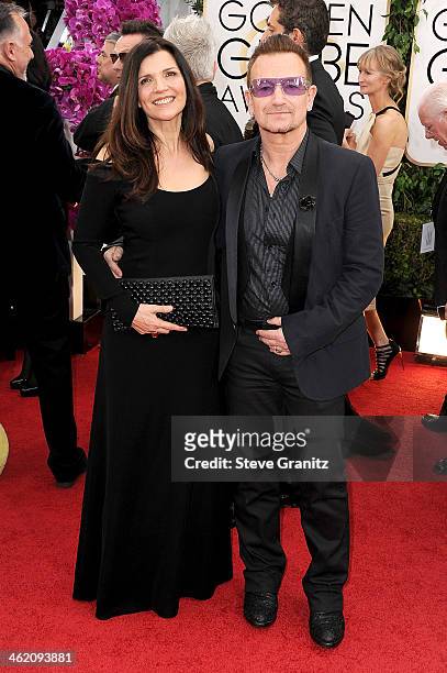 Singer Bono of U2 and Alison Hewson attend the 71st Annual Golden Globe Awards held at The Beverly Hilton Hotel on January 12, 2014 in Beverly Hills,...