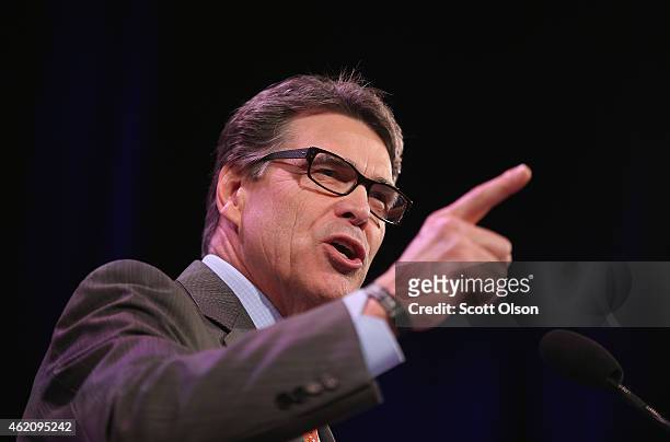 Former Texas Governor Rick Perry speaks to guests at the Iowa Freedom Summit on January 24, 2015 in Des Moines, Iowa. The summit is hosting a group...