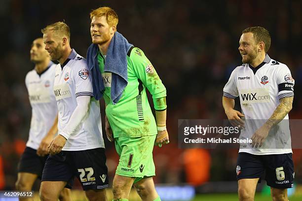 Eidur Gudjohnsen , Adam Bogdan and Jay Spearing of Bolton walk towards the travelling suppor to celebrate their sides draw on the final whistle...