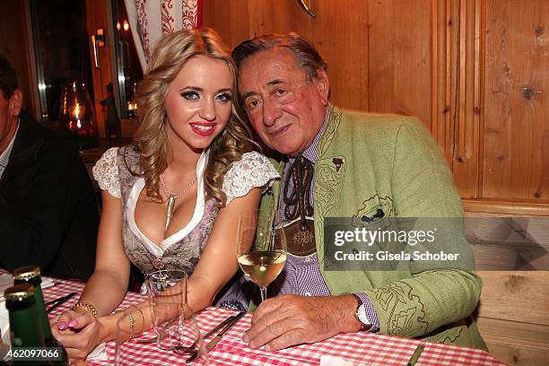 Richard Lugner and his wife Cathy 'Spatzi' Lugner during Rosi's Schnitzelparty at Sonnbergstuben on January 24, 2015 in Kitzbuehel, Austria.