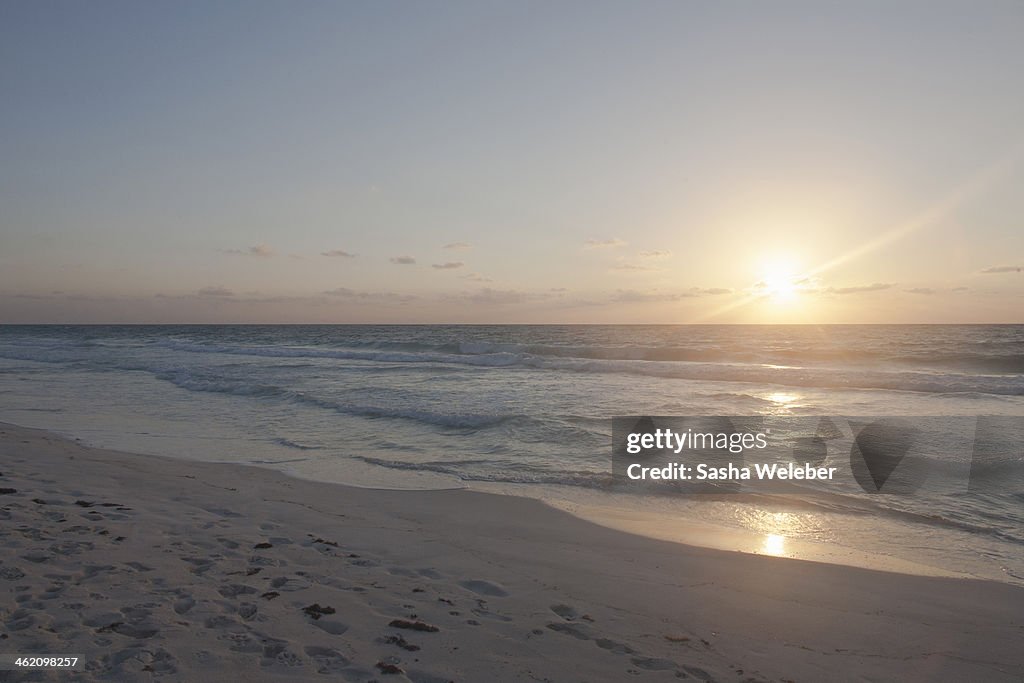 Sunrise on beach with Ocean