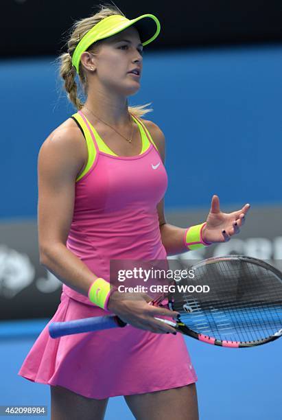 Canada's Eugenie Bouchard gestures during her women's singles match against Romania's Irina-Camelia Begu on day seven of the 2015 Australian Open...