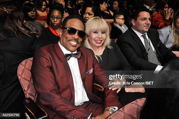 Singer Charlie Wilson and Mahin Wilson pose during "The BET Honors" 2015 at Warner Theatre on January 24, 2015 in Washington, DC.