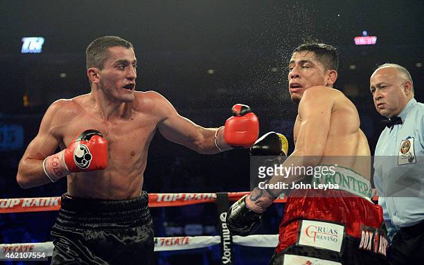 Mike Alvarado and Brandon Rios battle during the WBO International Welterweight Title fight January 24, 2015 at 1st Bank Arena.