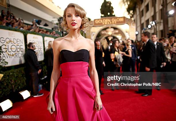 71st ANNUAL GOLDEN GLOBE AWARDS -- Pictured: Recording artist Taylor Swift arrives to the 71st Annual Golden Globe Awards held at the Beverly Hilton...