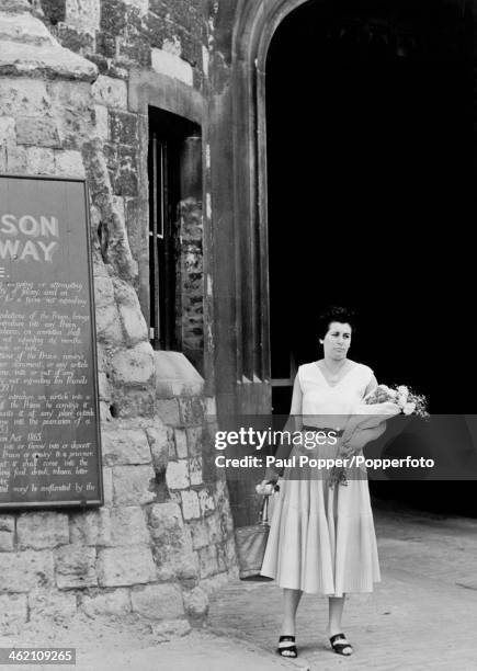 Jacqueline Dyer about to enter Holloway Prison to visit her friend, Ruth Ellis, the day before she is due to be hanged for the murder of David...