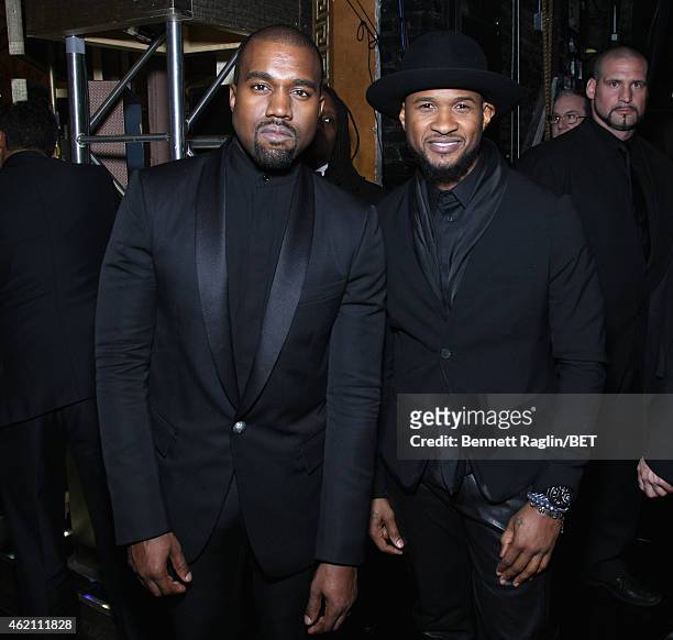 Kanye West and Usher pose backstage during "The BET Honors" 2015 at Warner Theatre on January 24, 2015 in Washington, DC.