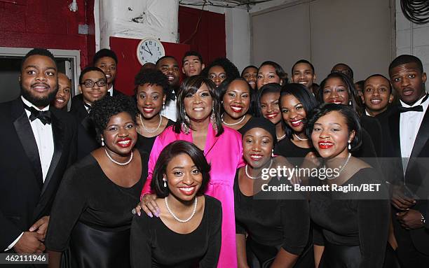 Singer Patti LaBelle poses with choir members backstage during "The BET Honors" 2015 at Warner Theatre on January 24, 2015 in Washington, DC.