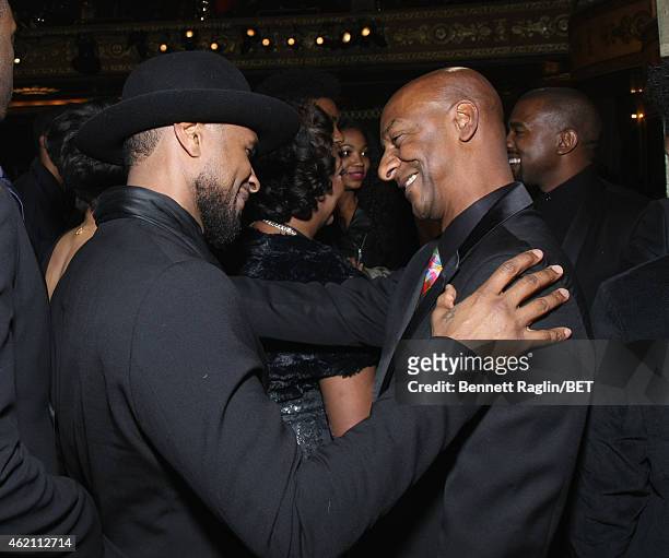 Usher and President of Programming for BET Stephen Hill pose backstage during "The BET Honors" 2015 at Warner Theatre on January 24, 2015 in...