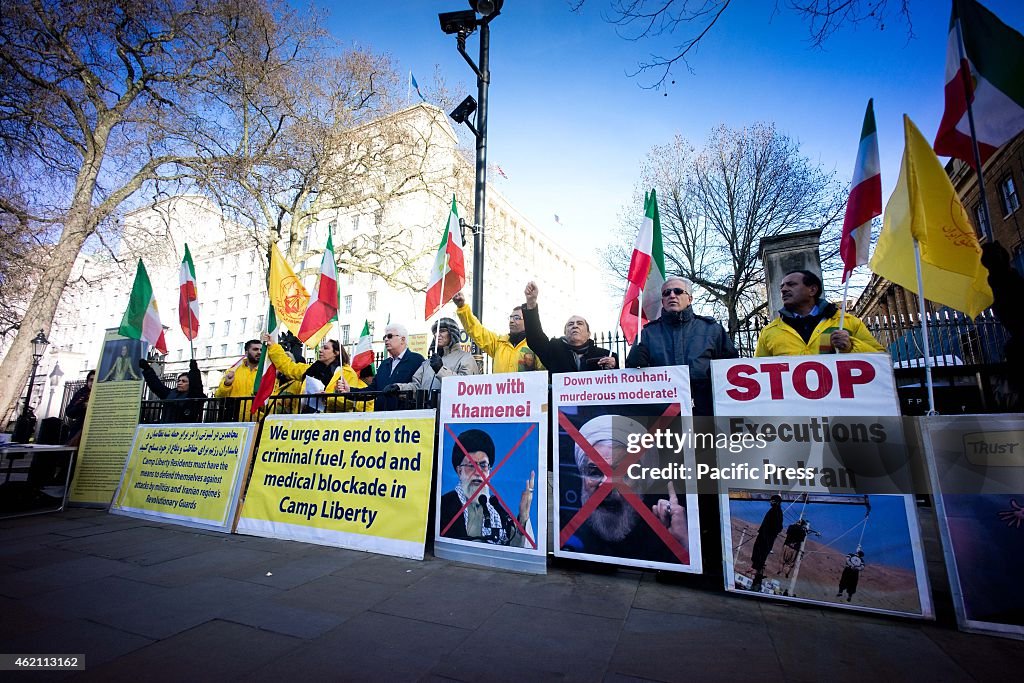 A few dozens of Iranians protest outside downing street...